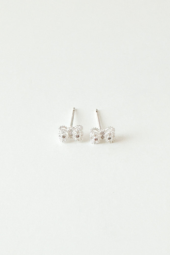 
                  
                    23240 Mini Silver Ribbon Earrings
                  
                